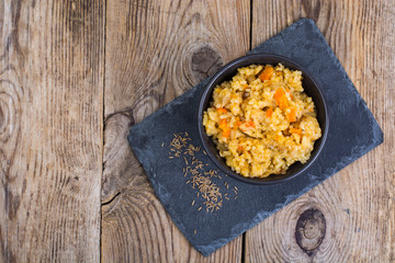 Pilaf with meat, vegetables and spices