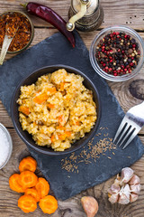 Pilaf with meat, vegetables and spices