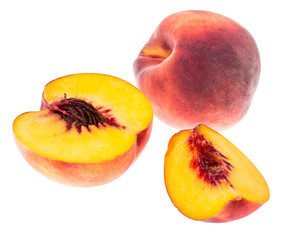 Delicious sweet ripe peach whole and slices on white
