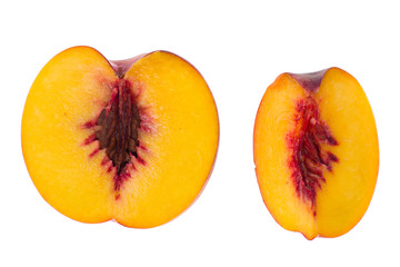 Sliced slices of fresh ripe peach on white background