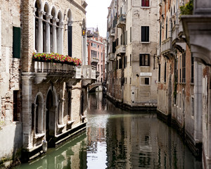 Fototapeta na wymiar You can walk all around or take a gondola a cross the city of Venice to find incredibles spots