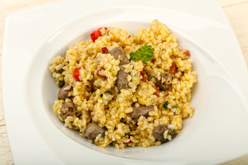 Bulgur with chicken hearts