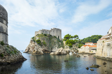 Fototapeta na wymiar Scenic view of the turquoise Mediterranean waters surrounding the walled medieval city of Dubrovnik, Croatia