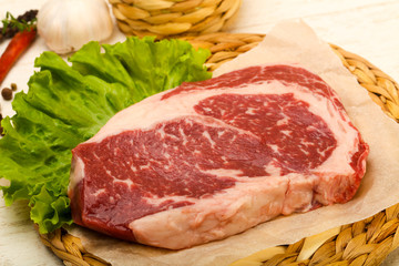Rib eye raw steak