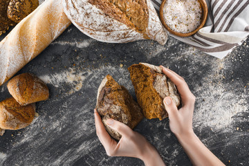 hands with homemade bread