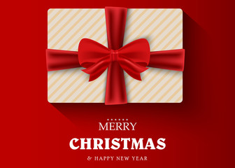 Gift on a red background with the wishes of Merry Christmas and Happy New Year. Greeting card or banner template. Vector illustration.