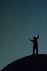 A man under the starry sky