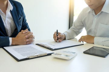 Yound Business man insurance agent and customer