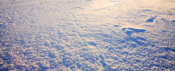 Snow background on the field