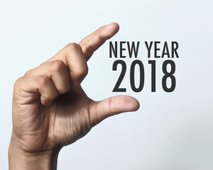 Hand showing new year 2018. © dolphfyn