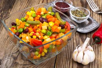 Vegetable dish with red beans in glass bowl