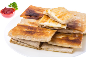 Grilled pita bread with cheese filling, close up,delicious and hearty breakfast