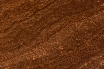 Tuinposter Brown onyx stone surface for decorative works or texture. © Dmytro Synelnychenko