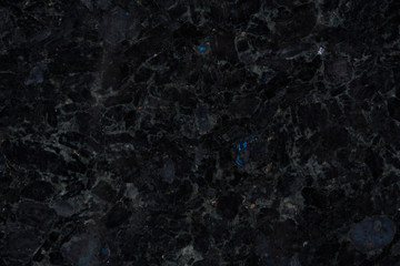 Precious black labradorite stone.