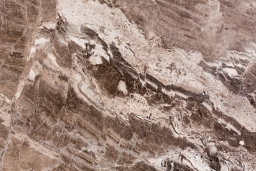 Brown marble stone seamless background pattern or texture.