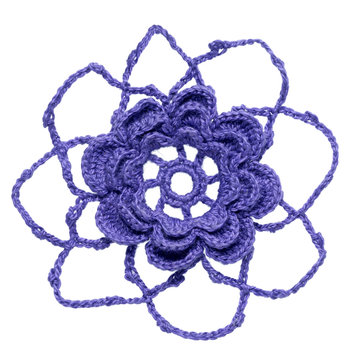 one crocheted flower element isolated on white background
