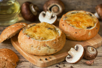 Mushroom julienne with cheese crust in bread bowl - Powered by Adobe