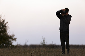 portrait with a young photographer in nature