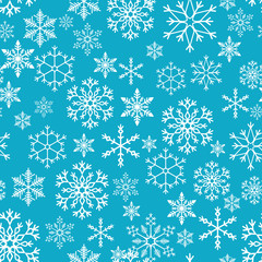Snowflakes seamless pattern. Snow falls background. Vector illustration. Seamless pattern on a blue background