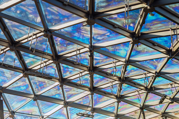 Fototapeta premium glass roof of building with views of the sky through the glass