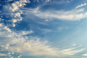Blue sky with fluffy clouds