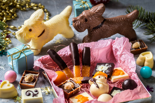 Chocolate Dogs And Candy On Light Background And Candied Fruit