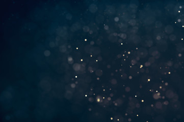 Glitter lights defocused background. Bokeh dark illustration