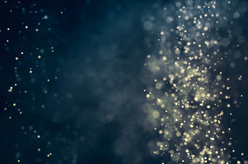 Obraz premium Glitter lights abstract background. Defocused bokeh dark illustration