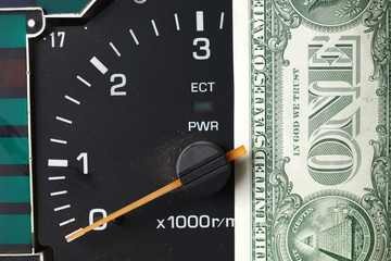 Banknote put tachometer gauge scene.