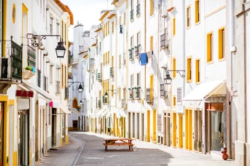 Keuken spatwand met foto Street view with beautiful old residential buildings in Evora city in Portugal © rh2010