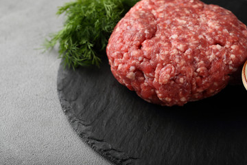Raw minced meat on slate