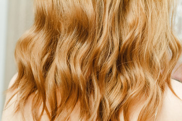 Naklejka premium Background Texture Of Red wavy Ginger Hair