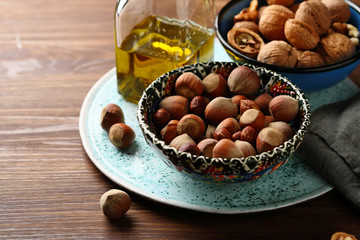 hazelnut on wood background