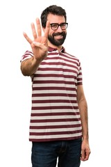 Fototapeta premium Man with glasses counting four