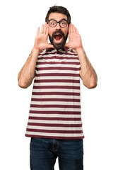 Fototapeta premium Man with glasses making surprise gesture