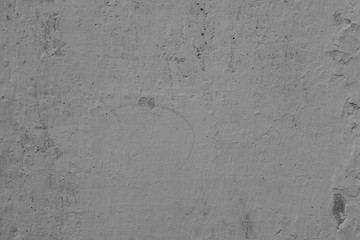 Wall fragment with scratches and cracks