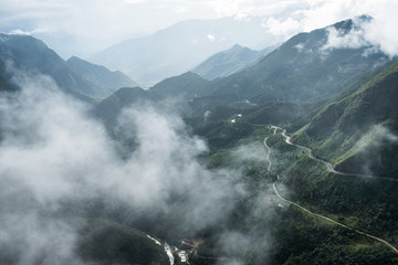 Fototapeta premium Viewpoint mountain range highest on fog in Tram Ton Pass