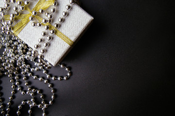 Christmas or New Year dark background, Xmas black board framed with season decorations