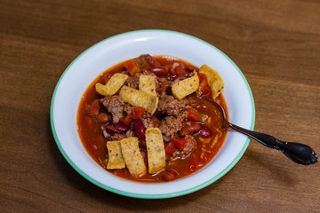 bowl of homemade chili with corn chips