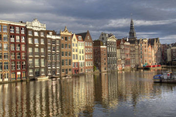 Obraz premium Historical houses on a canal in Amsterdam, Holland