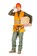 male builder or manual worker in helmet holding and moving  cardboard box on white background.