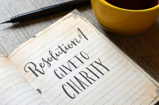 RESOLUTION No. 1 : GIVE TO CHARITY brush calligraphy in notebook 