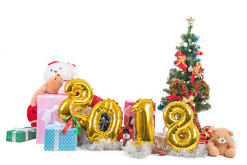 2018 happy new year and christmas concept with giftes, presents, dolls, christmas tree and xmas balloon, isolated on white background with clipping path and copy space