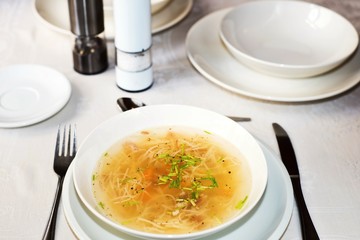 Beef broth in white background.