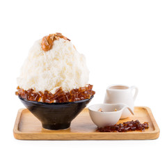 Korean shaved ice dessert with sweet toppings, red tea Bingsoo or Bingsu