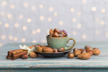 cup with a nuts decoration