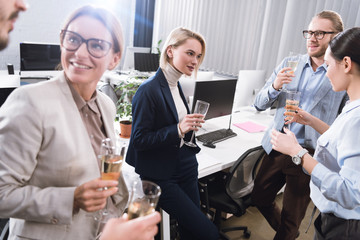 business team drinking champagne