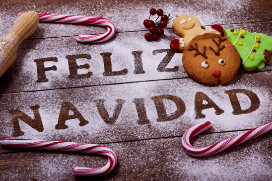 text feliz navidad, merry christmas in spanish - Powered by Adobe
