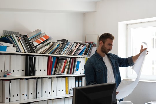 Handsome male architect working