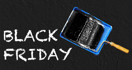 Painting tools and text on black Friday wall